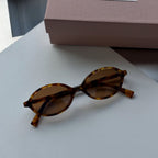 Óculos de Sol Miu
